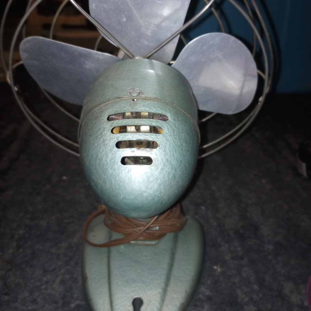 Antique metal fan